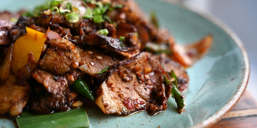 Enjoying the roasted pork in Guavate in Puerto Rico, tasting the flavours of the USA