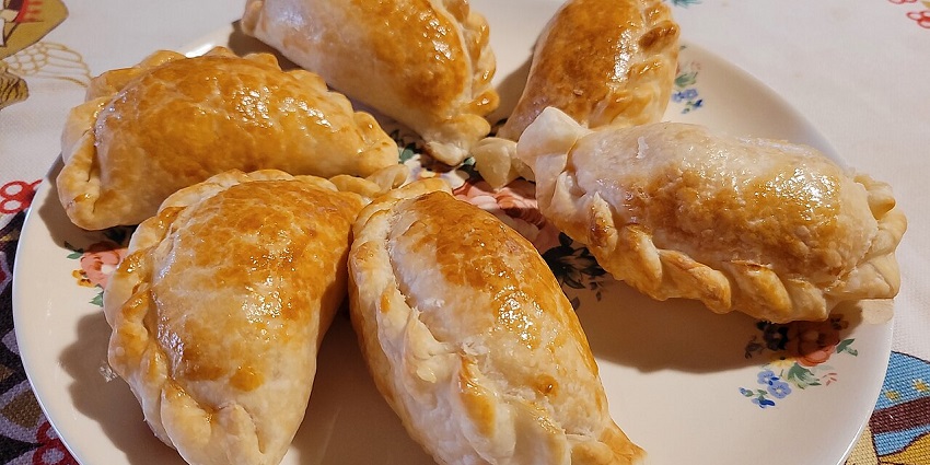 Flaky Panamanian Empanadas filled with cheese and beef.