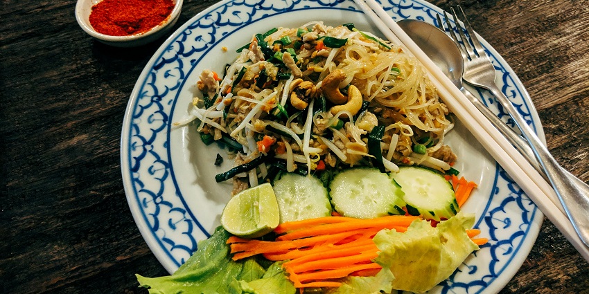 Image of a plate of traditional pad thai noodles, a happy and lovely thing to do in Similan.