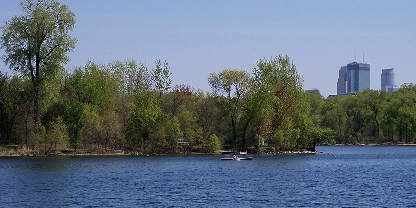 Things to do in Minneapolis include relaxing, biking, or boating around the Chain of Lakes perfect for outdoor activities.