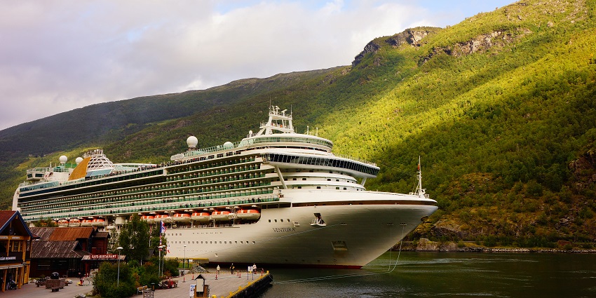 Sail past snow-covered peaks and quiet villages while exploring Norway’s majestic Arctic fjords