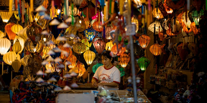 A bustling scene of Thung Song Night Market showcasing vibrant local food stalls.