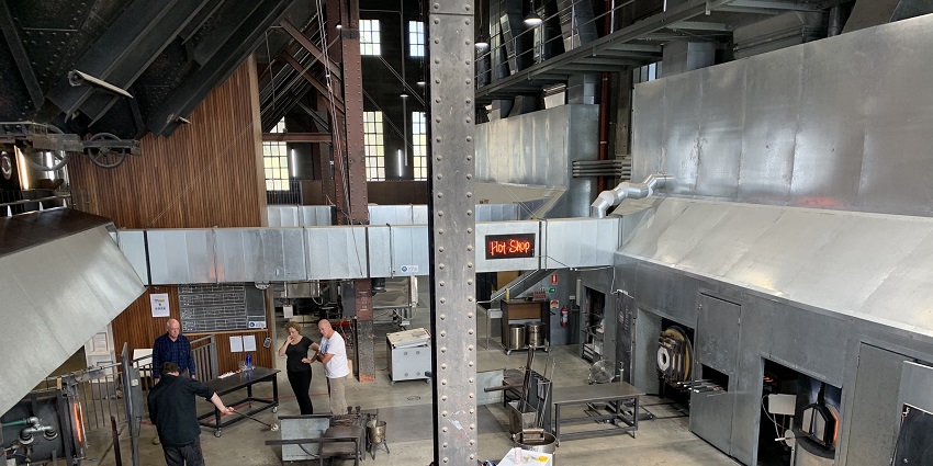 Observe live glass blowing and explore artistic glass installations in a historic industrial building.