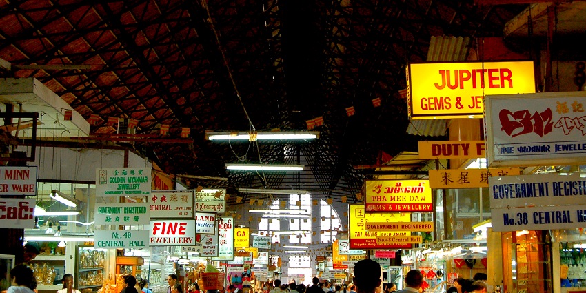 Experience the Theingyi Market, where vibrant stalls burst with local flavor and charm.