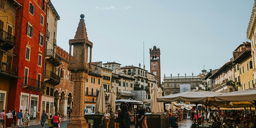Things to do in Verona include visiting the Bustling market square filled with flower stalls, fountains, and Renaissance buildings.