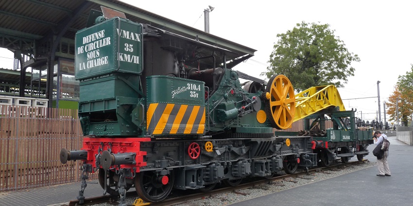 Historic trains at Train World, exploring them is among the top things to do in Belgium with family.
