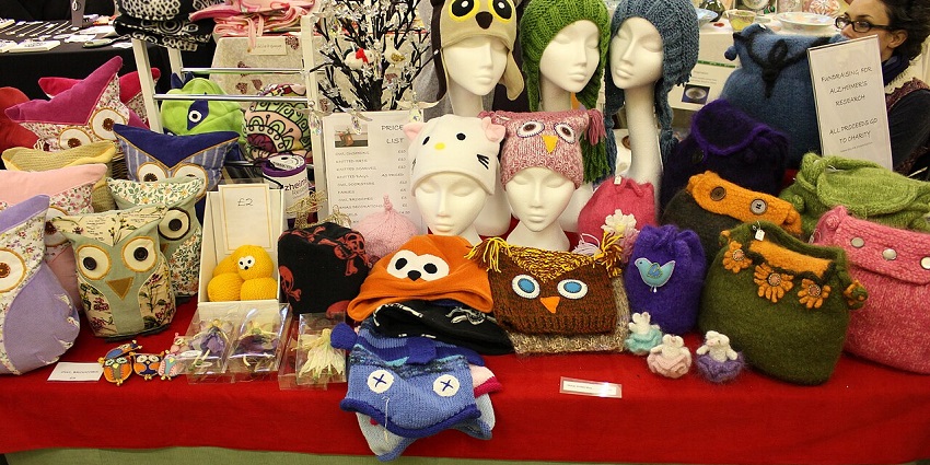 A display of stunning art and craft products in unique designs at a famous market at night