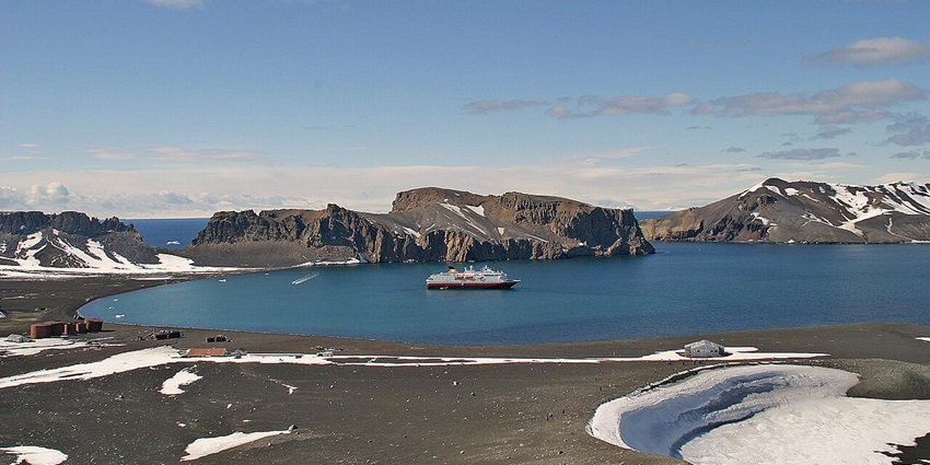 An image showing Deception Island, a popular thing to see in Antarctica.