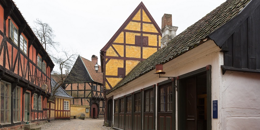 Exterior view of Den Gamle By in Aarhus showcasing its historic half-timbered buildings.