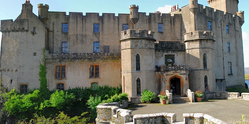 Historic castle with lush private gardens, showcasing exotic plants and Highland magnificence