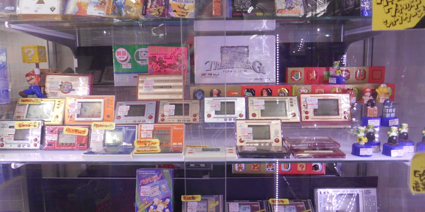 An image of vintage gaming consoles displayed at Super Potato in Akihabara.