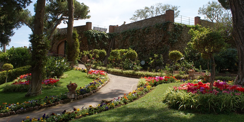 Visit the terraced gardens offering views of the coastline, among the best things to do in Capri.