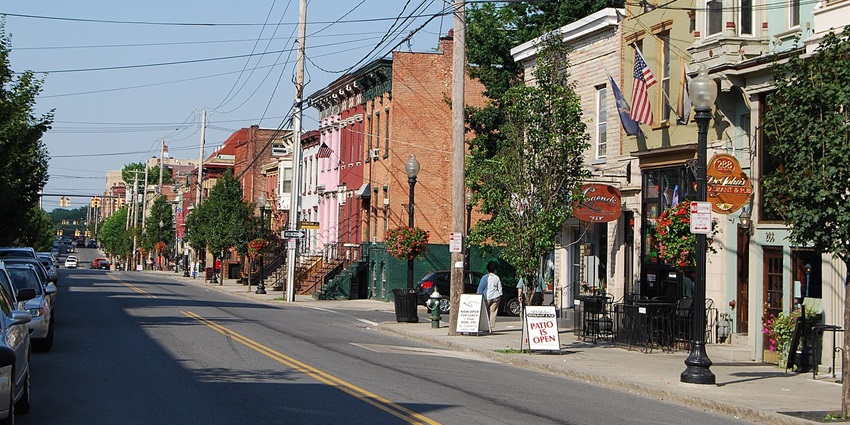 An image of people exploring Lark Street, which is among the things to see in Albany, Ny.