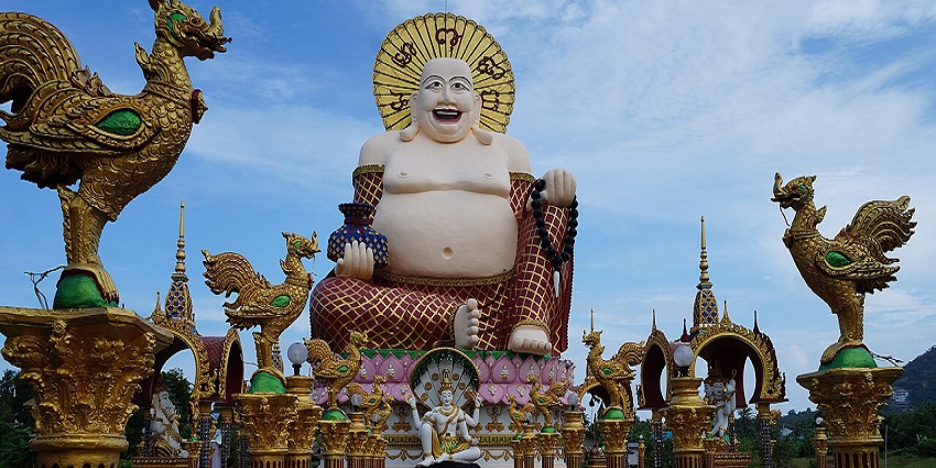 Visit Wat Plai Laem with family, among popular things to do in Chaweng Koh Samui.