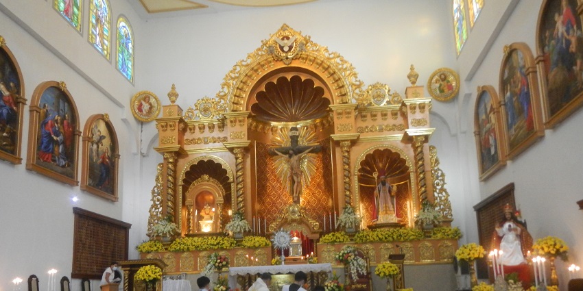 A group of artists play musical instruments while performing on Festival del Cristo Negro