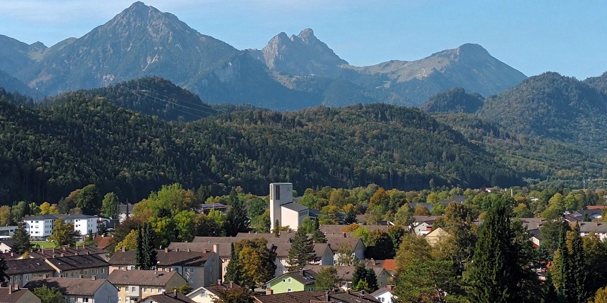 A view of the quaint hilly town of Fussen with its pretty houses and lush greenery, amongst the top hill stations in Germany.