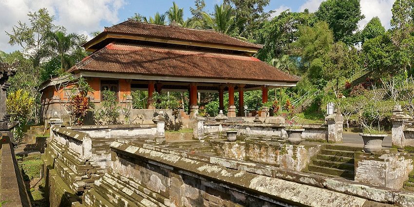 The Goa Gajah temple in Indonesia features intricate stone carvings at its entrance.