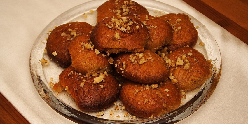 Assorted sweets such as baklava and loukoumi, rich in honey, nuts, and aromatic spices, are among the best things to buy in Greece.