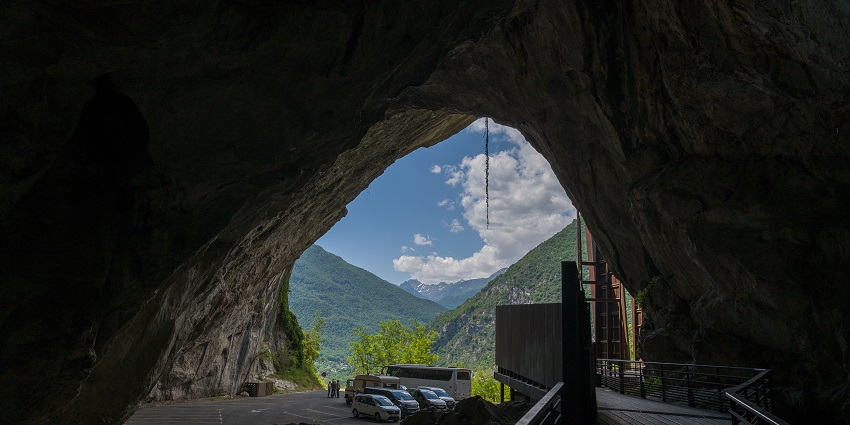 An image of Grotte de Niaux, showcasing prehistoric cave paintings and rock formations.