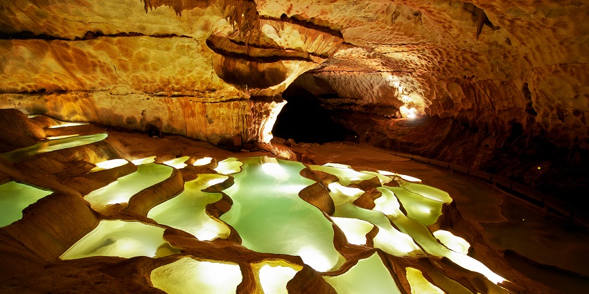An image of subterranean formations inside Grotte de Saint-Marcel d'Ardèche in France.