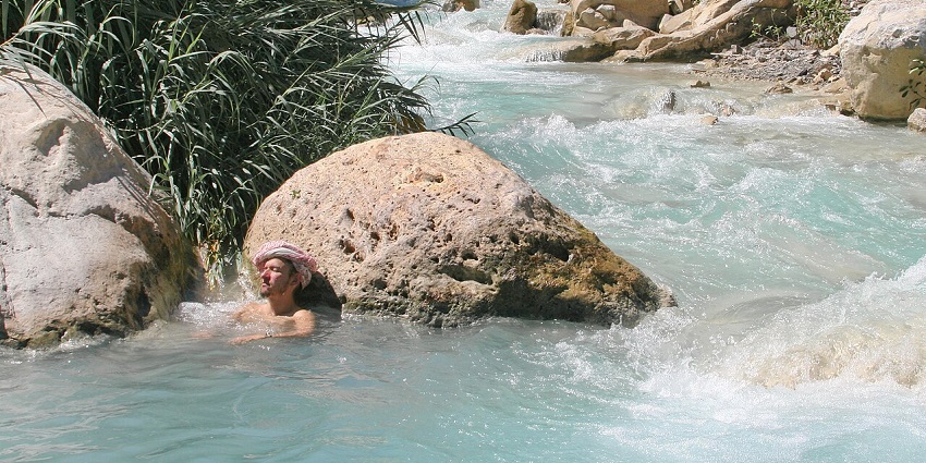 An image of thermal waters and cave formations at Grutas Tolantongo in Mexico.