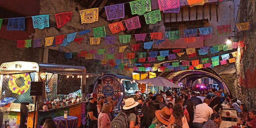 Streets of Guanajuato bustling with people exploring during the Day of the Dead festival