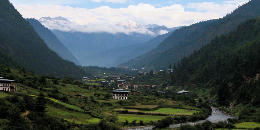 A remote valley nestled among the Himalayas, rich in culture, forests, and traditional Bhutanese homes.