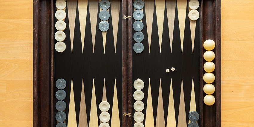 Artistic wooden backgammon sets, popular in Greek cafes and homes as a social pastime.