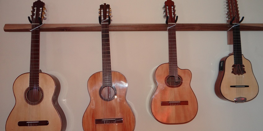 Multiple handcrafted guitars, a top thing to buy in Cebu, Philippines, ready to be sold.