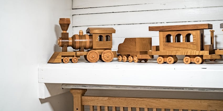 An image showing a view of a wooden toy resembling a handmade Swiss wooden toy.