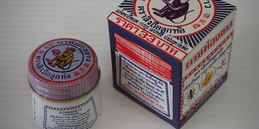 Small jars of herbal balm and liniment, placed on pharmacy shelves, are useful things to buy in Pattaya for relief.