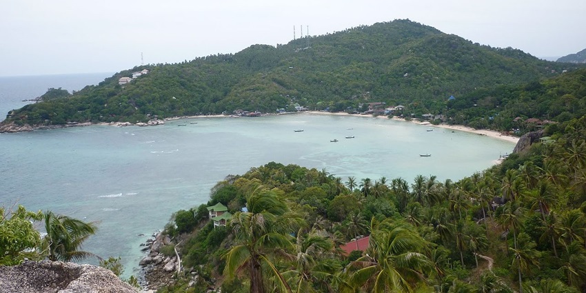 Trek to John-Suwan Viewpoint for a breathtaking sunrise overlooking the lush coastline, among the best things to do in Koh Tao.