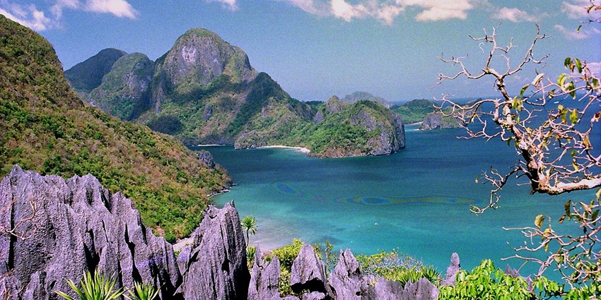 Take on the challenge of hiking Taraw Cliff in El Nido for panoramic views of the bay.