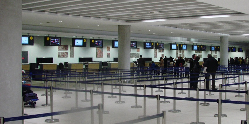 An image of Check-in hall at Paphos International Airport, Cyprus, featuring modern architecture.