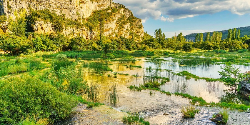A scenic view of Huang He Valley with winding riverbanks and natural surroundings.