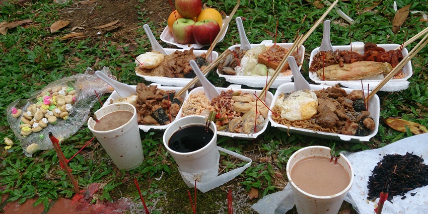 Image of food provided for spirits during 7th Month offerings to hungry ghosts in Singapore
