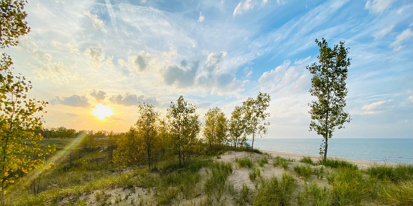A sunrise from Indiana Dunes National Park, one of the serene places to visit near Chicago.