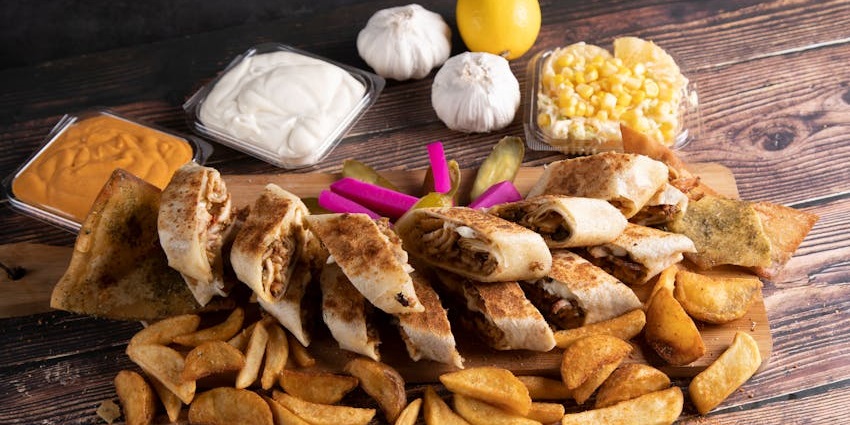 Delicious dishes showcasing the diverse cuisine of Dubai.