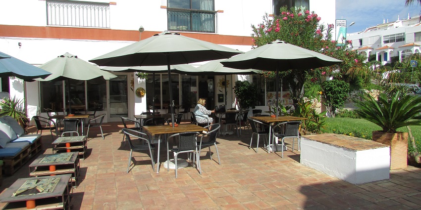 An image of a cafe in Albufeira serving local foods & drinks, among the things to do in Albufeira, Portugal.
