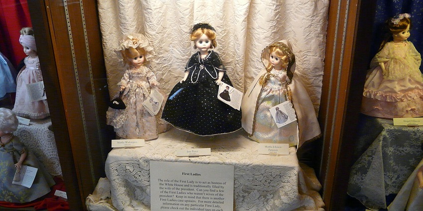Visitors exploring the exhibits at the International Dolls Museum
