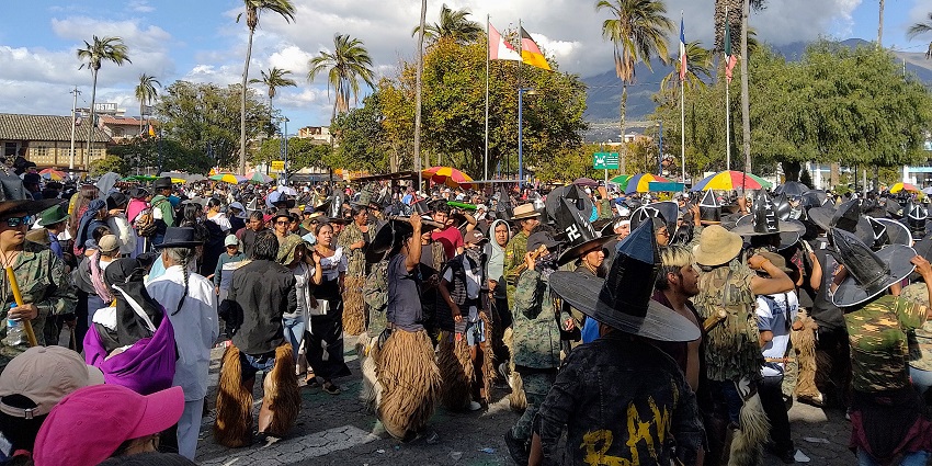 Participants celebrate Pachamama in Otavalo and Saraguro during vibrant ancestral festivals in Ecuador, honoring Andean traditions.