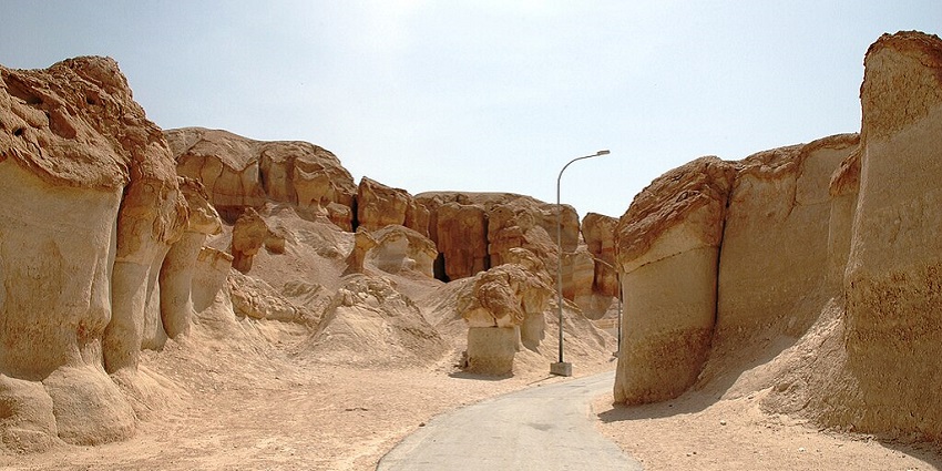 An image of the sunlit entrance of Jabal Qarah Cave, one of the famous caves in Saudi Arabia.