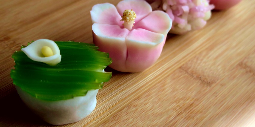 A close-up of beautifully crafted wagashi sweets, a delicate thing to buy in Japan for food lovers.