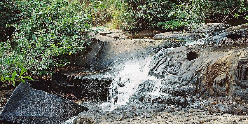 Picture of K’bal Spean waterfall and lingas representing its beauty and tradition in Angkor, Cambodia