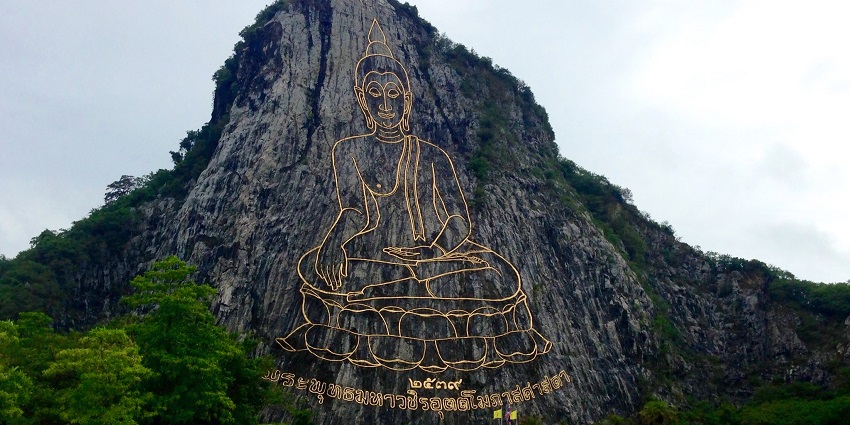 View of the majestic Khao Chi Chan with tourists wandering around