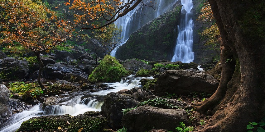 A picturesque, paradise-like view of Khlong Lan Waterfall amongst the top waterfalls in Thailand.
