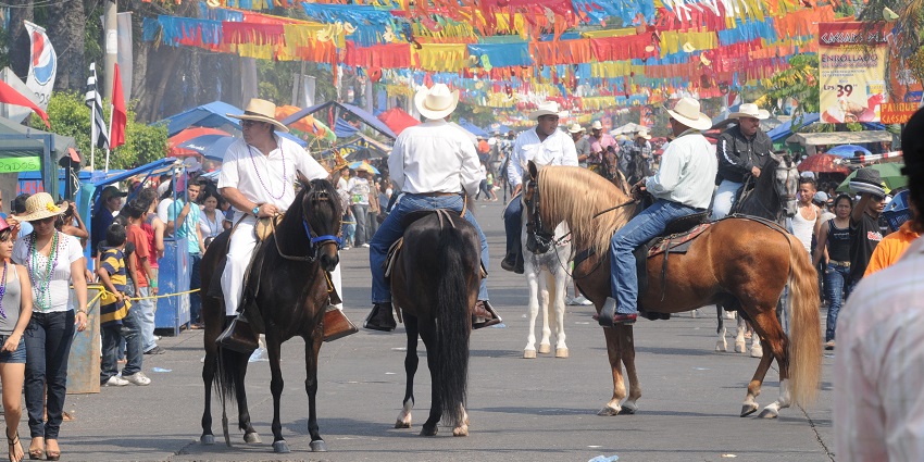 Floats, costumes, and confetti brighten up the streets during La Ceiba Carnival.