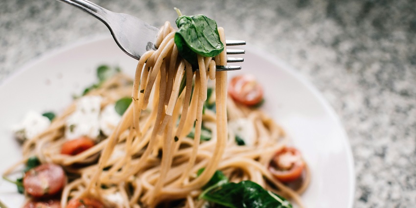 An image of pasta with tomato and basil at La Pargola, a place to taste food in Italy.