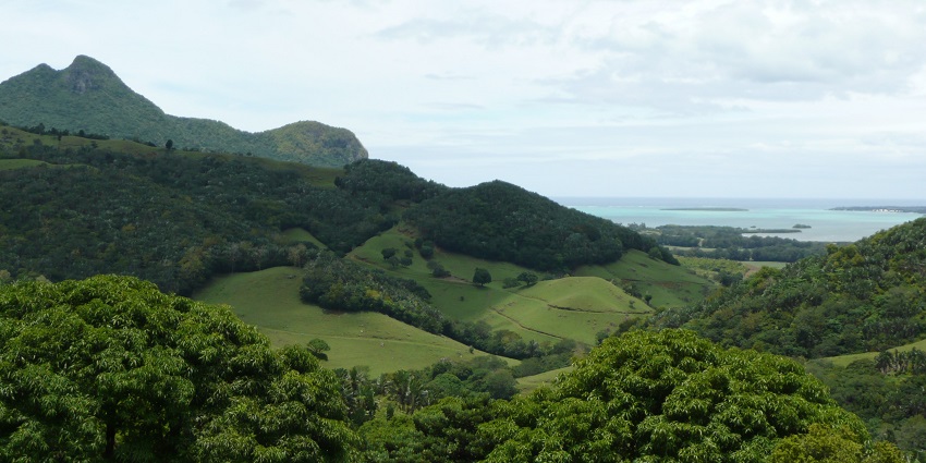 An image of the scenic La Vallée de Ferney overlooking Ile aux Aigrettes in Mauritius.