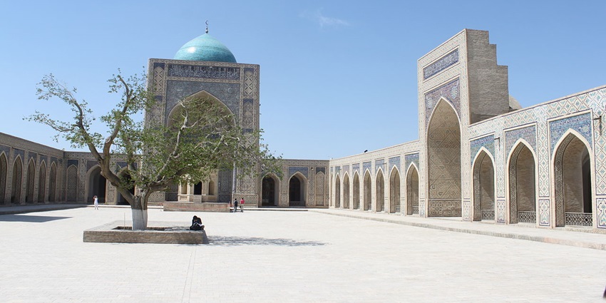 Marvel at the towering minaret and intricate blue tiles, among the best things to do in Bukhara.